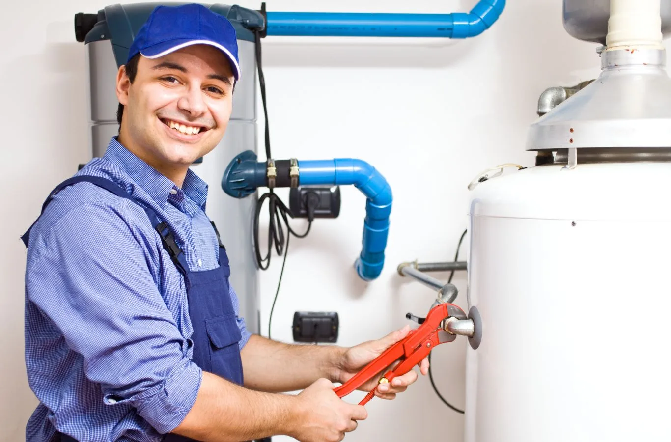 A skilled MPH Boilers technician installing an LPG boiler in Edinburgh, showcasing professional expertise and advanced tools for reliable heating solutions.